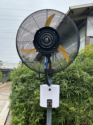 Industrial mist wall fan.